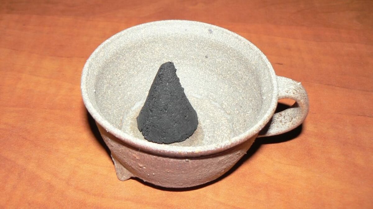 František: charcoal incense cone producing scent of Czech